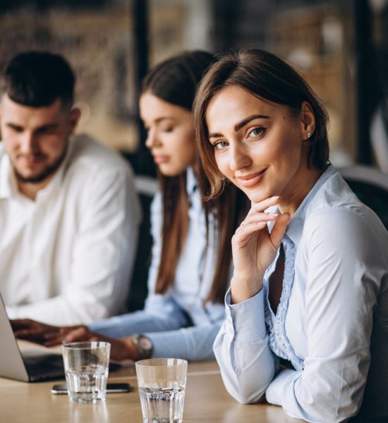 group-people-working-out-business-plan-office_1303-15876